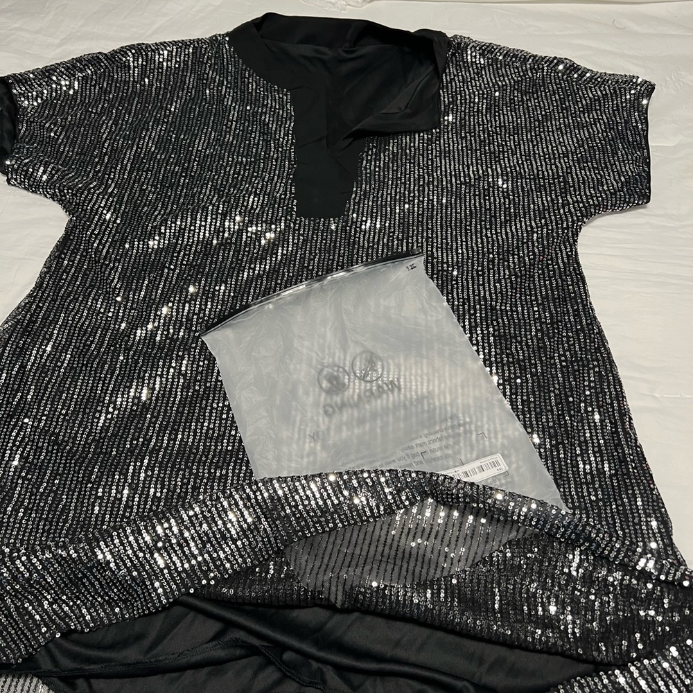 beautiful short sleeve sequin dress size in US is 2x3x out of 4x from SHEIN